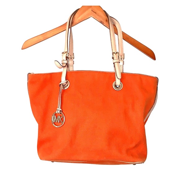 Michael Kors Handbags - Michael Kors orange thick fabric tote GUC